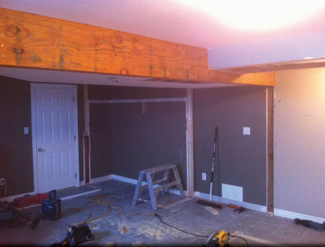 Customer wanted to join the two bedrooms into a rec room. Beam was needed for load bearing wall.